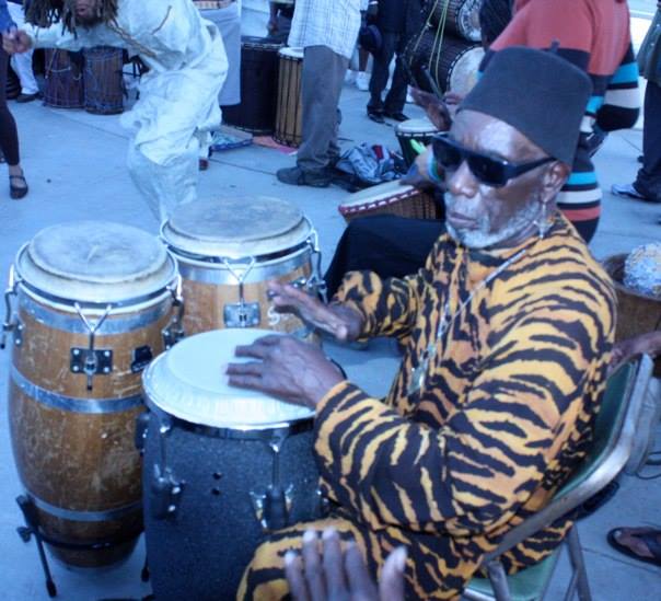 african drummer w tiger outfit
