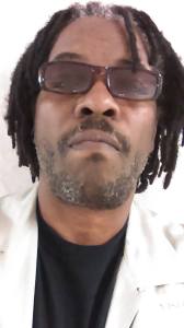 bobby w shades and black undershirt