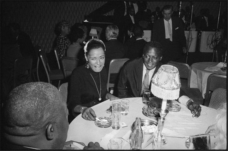 Miles Davis & Billie with Jimmy Rushing seated