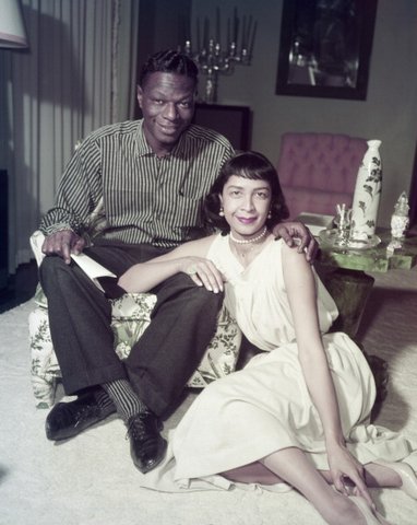 NAT KING COLE -- Pictured: (l-r) Singers Nat 'King' Cole, Maria Cole at home in 1957 -- (Photo by: Frank Carroll/NBC/NBCU Photo Bank via Getty Images)