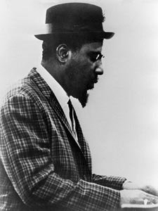 t-monk-at-piano-plaid-jacket